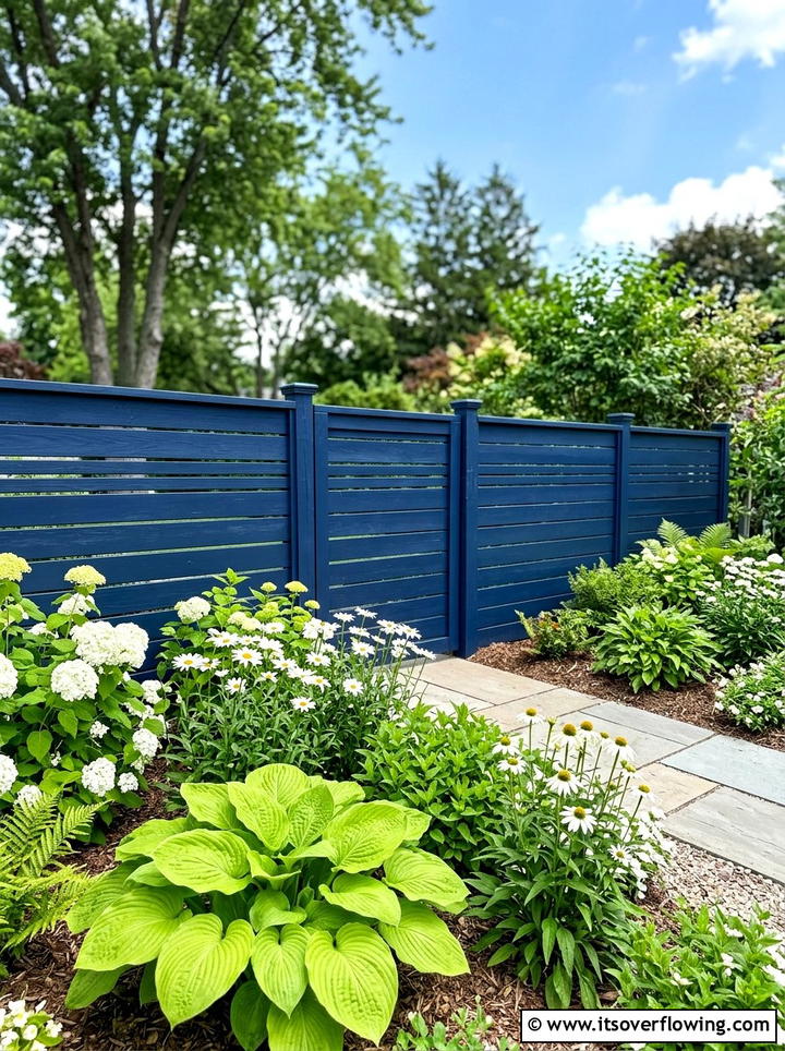 Painted Wood Fence - 25 small garden ideas for quick makeover