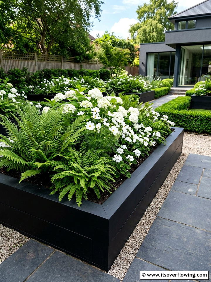 Painted black garden beds - 25 backyard ideas with raised planter boxes