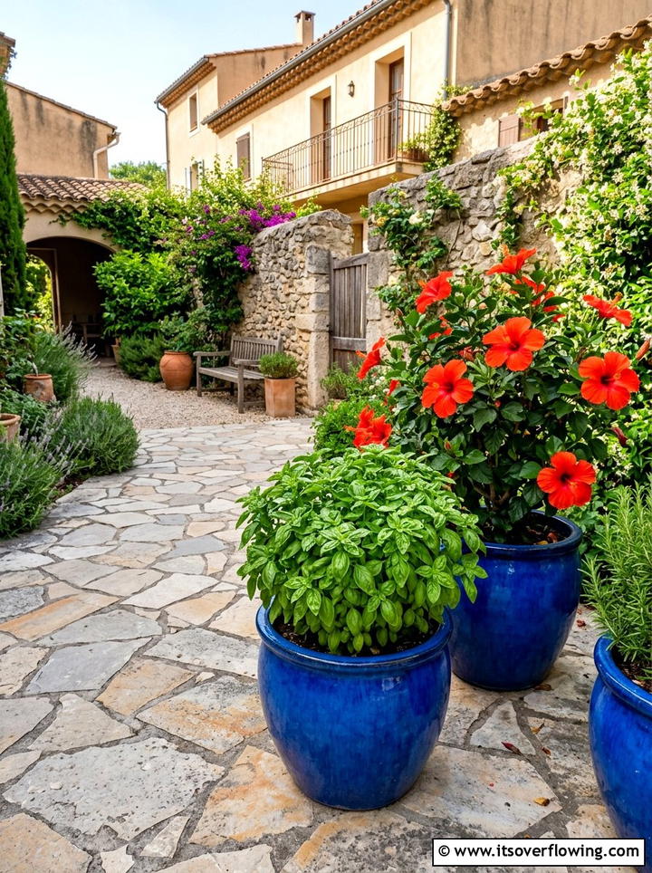 Paved Courtyard Herb Pots - 25 garden design ideas with herbs and flowers