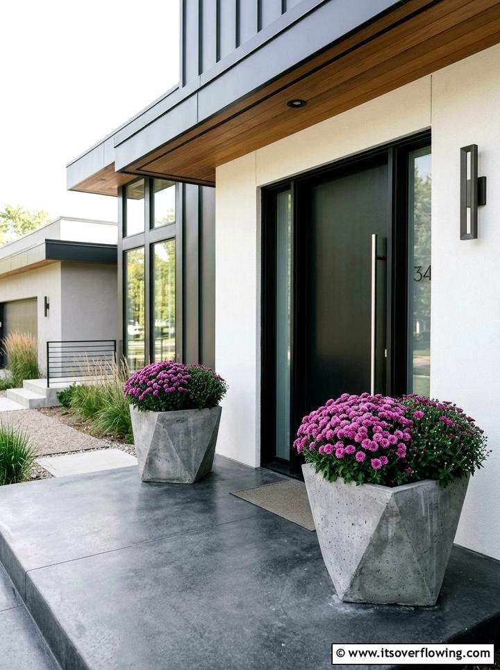 Purple mums in concrete planters - 25 front porch ideas with mums