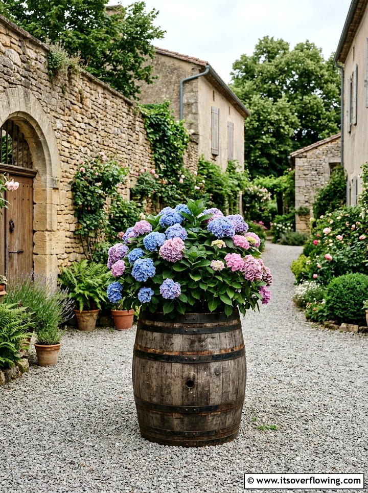 Reclaimed Wood Barrel Planter - 25 garden decor ideas with wooden planters