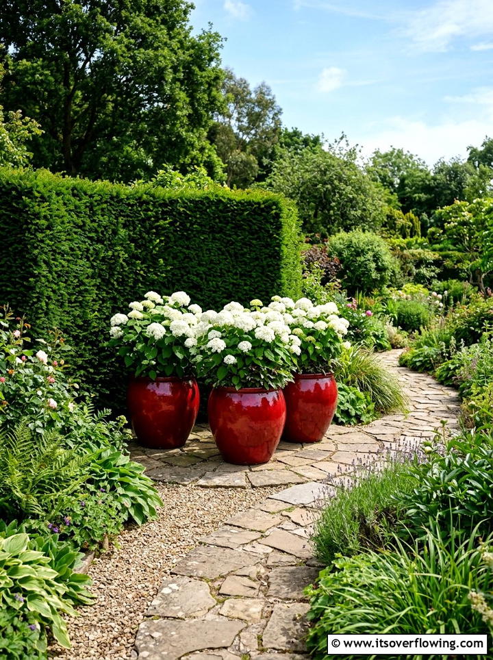 Red Ceramic Planters - 25 creative garden ideas with colorful pots
