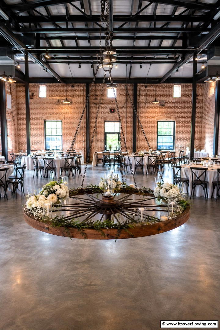 Rustic Vintage Bicycle Wheel Centerpiece - 30 Rustic Wedding Centerpieces for a Charming Celebration