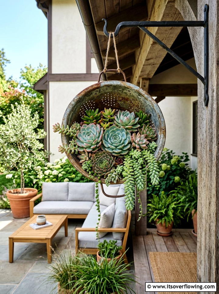 Rustic metal colander planter - 25 reusing old things ideas for succulent garden