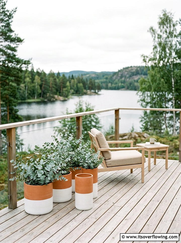 Scandinavian deck with dipped planters - 25 creative garden ideas with painted planters