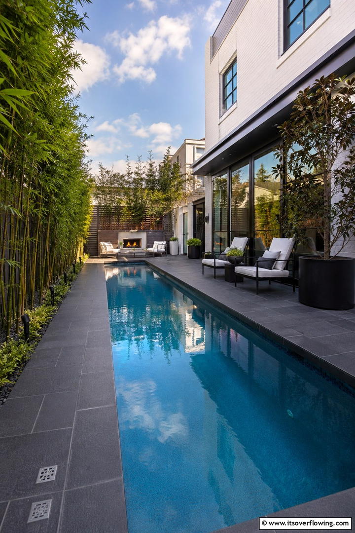 Sculptural Pool Feature - 30 Small Pool Ideas for Compact Outdoor Living Spaces