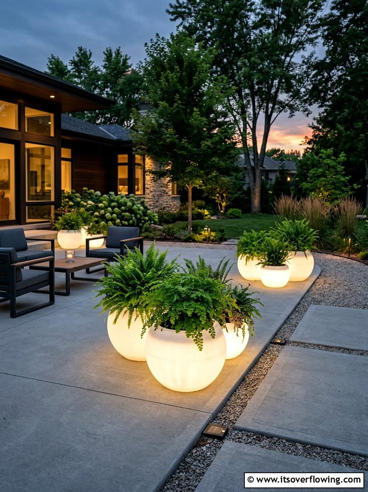 Solar Glowing Planters - 25 backyard ideas with solar lights