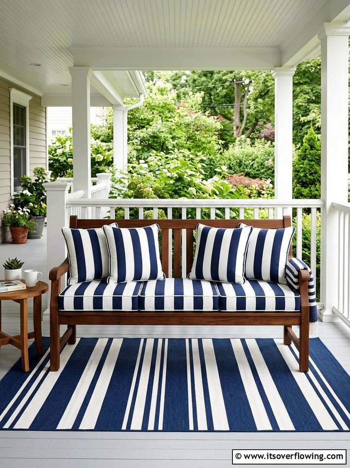 Striped outdoor cushions - 25 front porch ideas with pops of color