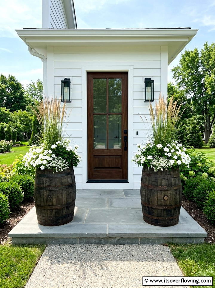 Symmetrical entryway barrel planters - 25 front porch ideas with barrel planters