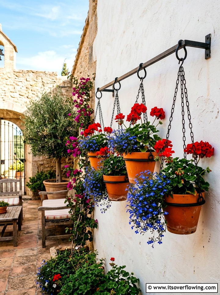 Terracotta Pot Hanger - 25 creative garden ideas with wall mounted planters