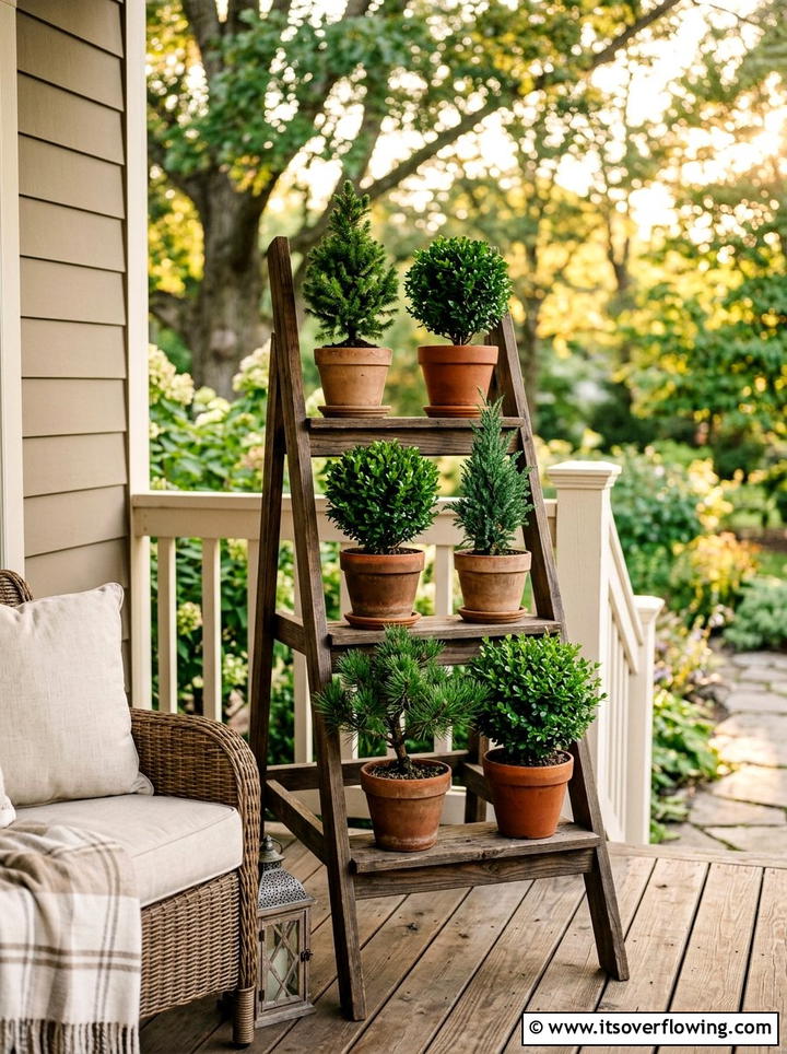 Tiered porch planter with mini trees - 25 front porch decor ideas with mini trees