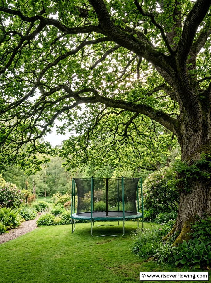 Trampoline Under Tree Canopy - 25 backyard ideas with trampoline zone