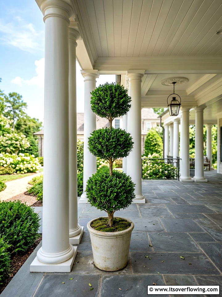 Triple ball topiary tree - 25 front porch ideas with topiaries
