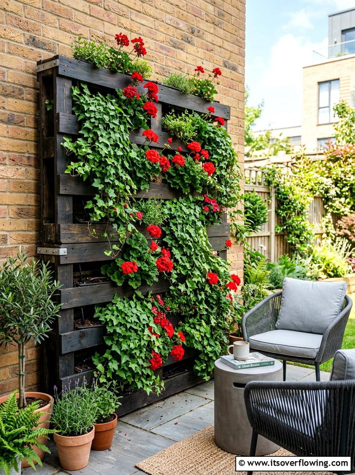 Vertical Garden Pallet Wall - 25 upcycled garden ideas with privacy screens