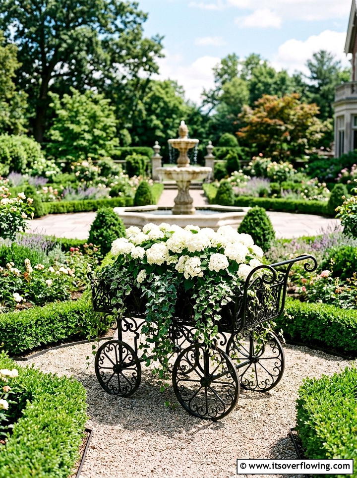 Victorian Style Iron Wagon - 25 upcycled garden ideas with old wagons
