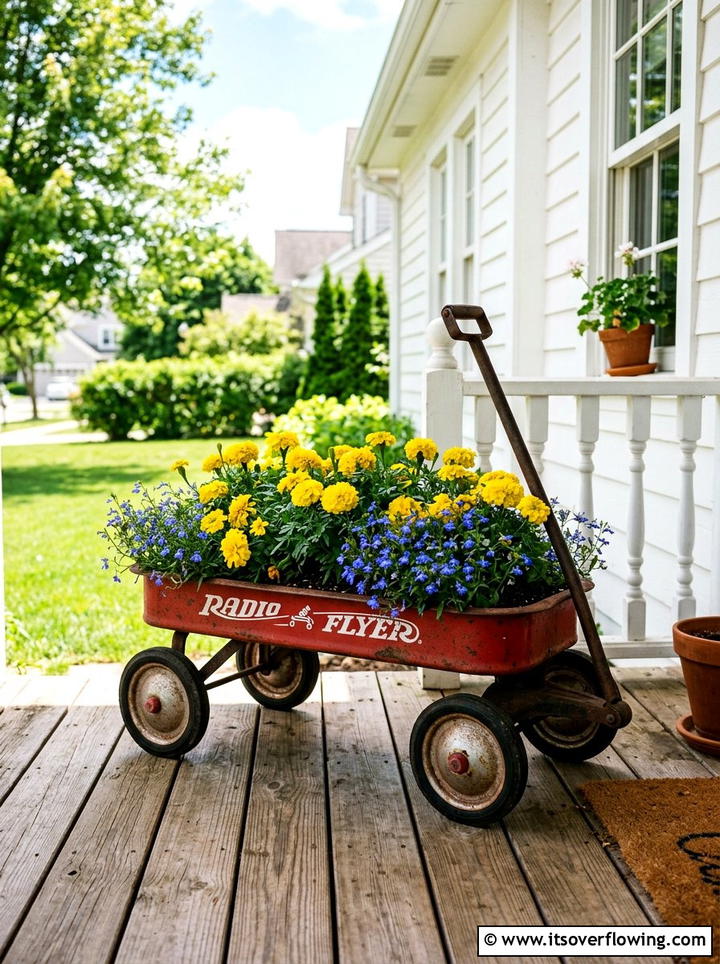Vintage Metal Red Wagon Planter - 25 upcycled garden ideas with old wagons