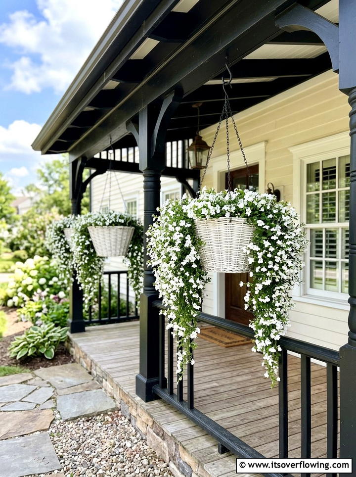 White Hanging Baskets On Black Porch - 25 creative garden ideas with black and white gardens