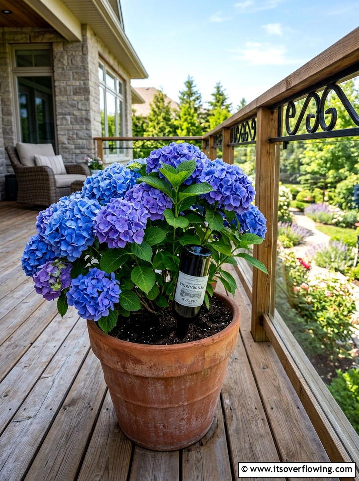 Wine Bottle Self Watering System - 25 upcycled garden ideas with wine bottles