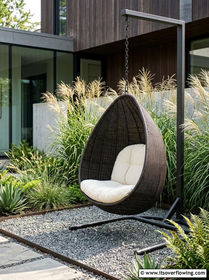 Woven Rattan Tear Drop Swing - 25 backyard ideas with swings