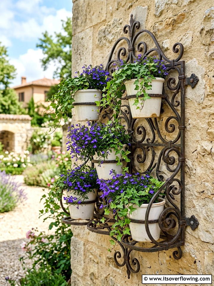 Wrought Iron Wall Rack - 25 small garden ideas with vertical planters
